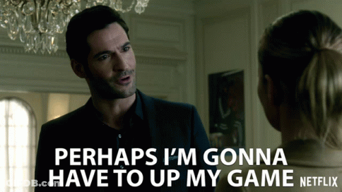 Man In Suit Talking To Woman Saying Perhaps I'm Gonna Have To Up My Game Netflix GIF