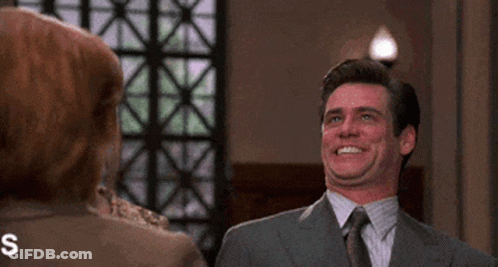 Man In Suit Talking To Woman Saying Shhhhshushh GIF