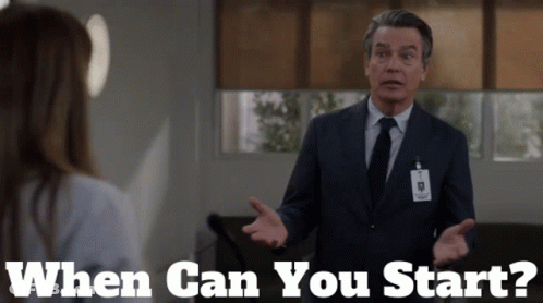 Man In Suit Talking To Woman Saying When Can You Start GIF