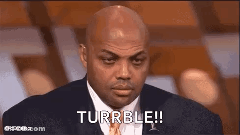 Man In Suit Talking To Young Boy GIF