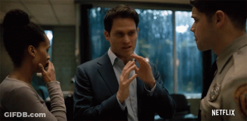 Man In Suit Talks To Woman And Police Officer Netflix GIF