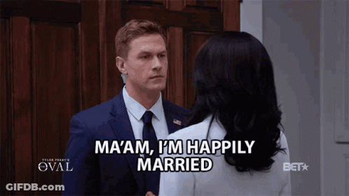Man In Suit Talks To Woman Saying Ma Am I M Happily Married GIF