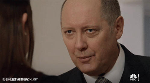 Man In Suit Talks To Woman #Theblacklist GIF