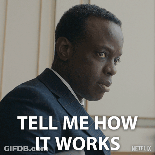 Man In Suit Tell Me How It Works GIF