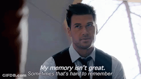 Man In Suit Telling Woman Memory Isn't Great GIF