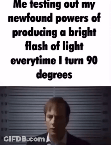 Man In Suit Testing Newfound Powers Meme GIF