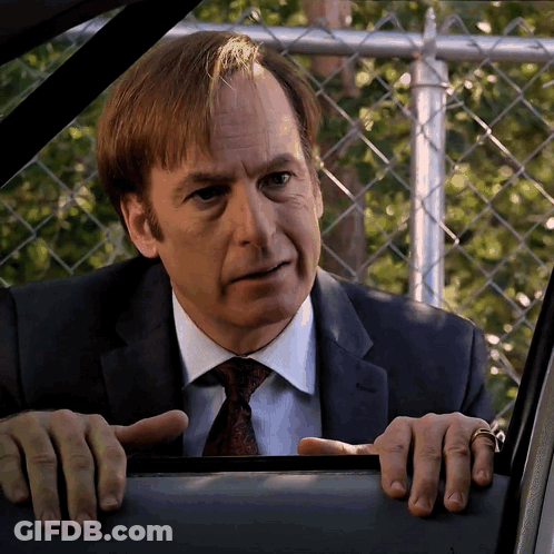 Man In Suit Testing Newfound Powers Meme GIF