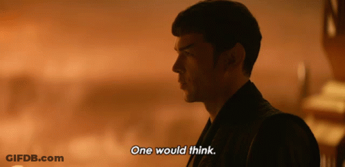 Man In Suit Thinking In Dark Room GIF