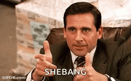 Man In Suit Thumbs Up And Pointing At Camera GIF