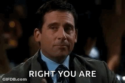 Man In Suit Thumbs Up Holding Glass Of Water GIF