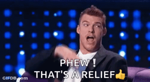 Man In Suit Thumbs Up Saying Phew That's A Relief GIF