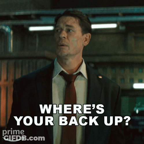 Man In Suit Tie Asking Where's Your Backup GIF