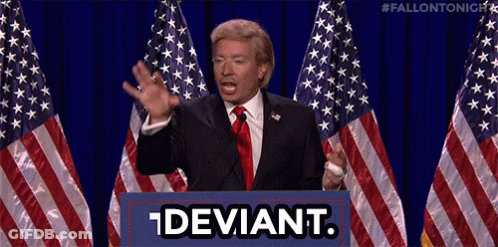 Man In Suit Tie At Podium Deviant GIF