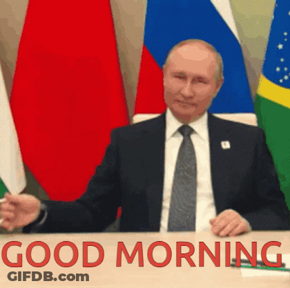 Man In Suit Tie Flags Good Morning Sign GIF