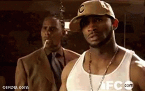 Man In Suit Tie Funny Face Colorful Hat GIF