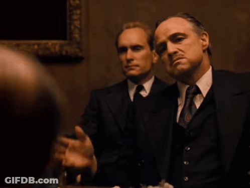 Man In Suit Tie Looking At Another Man GIF