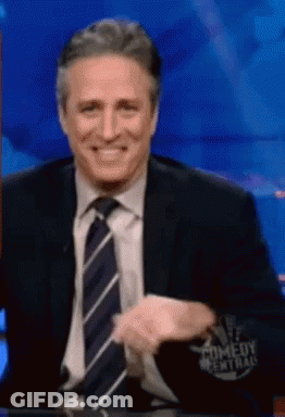 Man In Suit Tie Smiling Comedy Central Shirt GIF