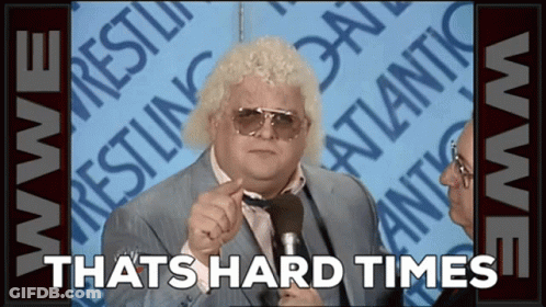 Man In Suit Tie Talking Microphone Thats Hard Times GIF