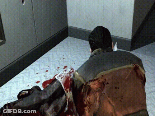 Man In Suit Touching Another Man's Neck In Living Room GIF