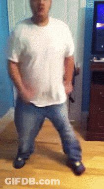 Man In Suit Tying His Tie GIF