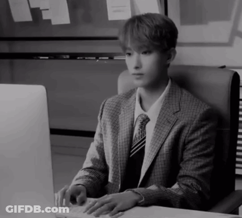 Man In Suit Typing On Keyboard GIF
