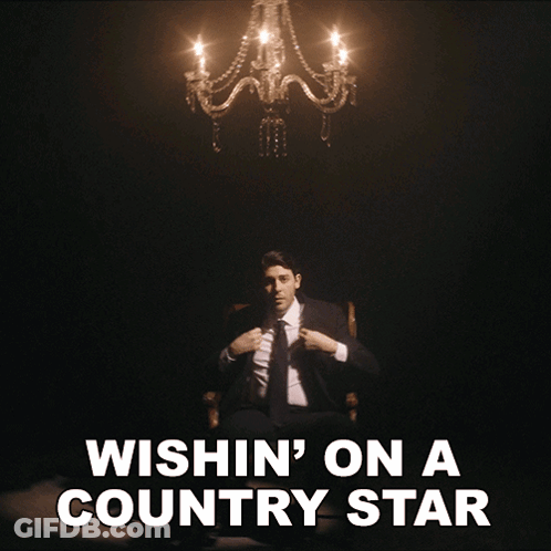 Man In Suit Under Chandelier Wishing Country Star GIF