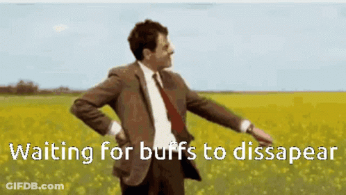 Man In Suit Waiting For Buffs To Disappear GIF