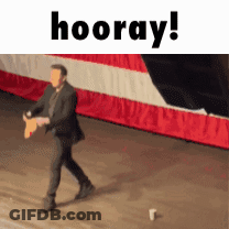 Man In Suit Walking Before American Flag Hooray GIF