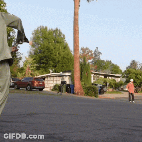 Man In Suit Walking Bridge GIF