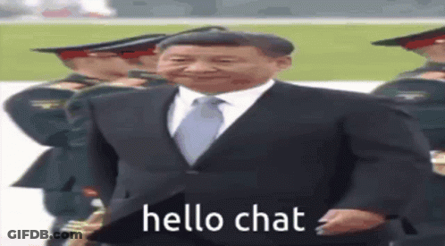 Man In Suit Walking In Front Of Soldiers Saying Hello Chat GIF