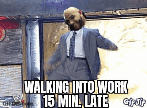 Man In Suit Walking Into Work 15 Min Late GIF