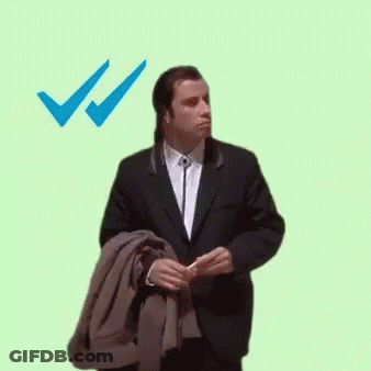 Man In Suit Walking Jacket Over Shoulder Check Mark GIF