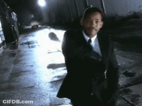 Man In Suit Walking Night Street GIF