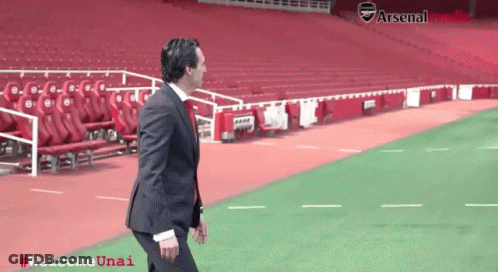 Man In Suit Walking On Soccer Field Welcome Unai GIF