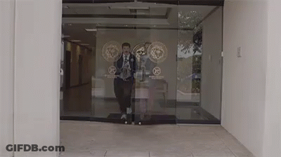 Man In Suit Walking Out GIF