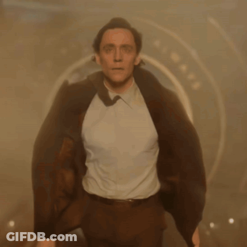 Man In Suit Walking Through Tunnel Saying Always GIF