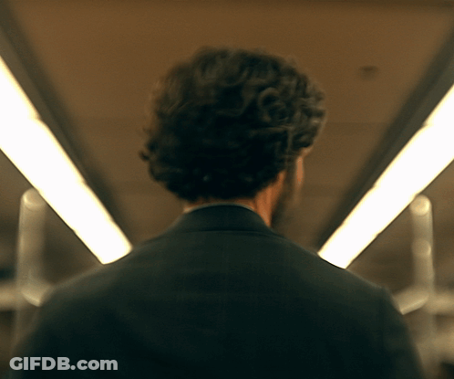 Man In Suit Walking Tunnel GIF