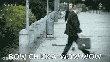Man In Suit Walking With Briefcase GIF