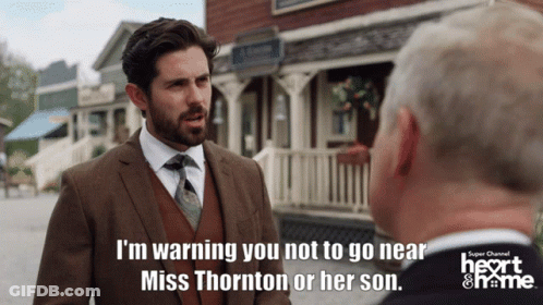Man In Suit Warning Another Man GIF