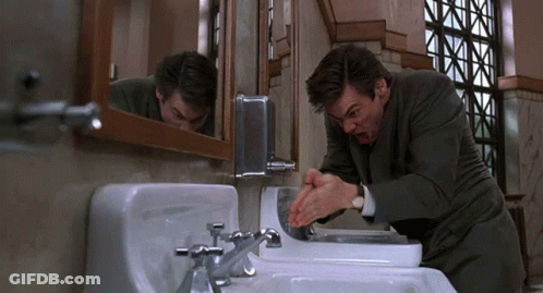 Man In Suit Washing Hands GIF