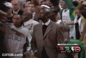 Man In Suit Watching Celtics Vs Pistons Basketball GIF