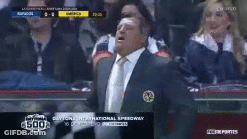 Man In Suit Watching Game GIF