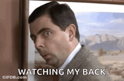 Man In Suit Watching Painting GIF