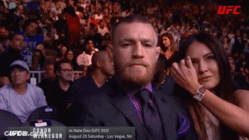 Man In Suit Watching UFC Fight GIF
