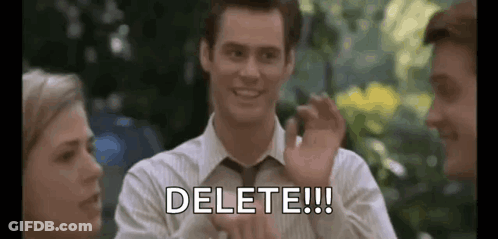 Man In Suit Waving And Saying Delete GIF