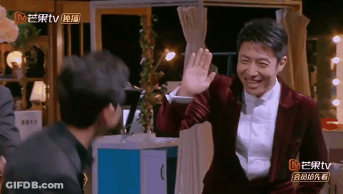 Man In Suit Waving At Another Man MTV GIF
