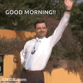 Man In Suit Waving Good Morning GIF