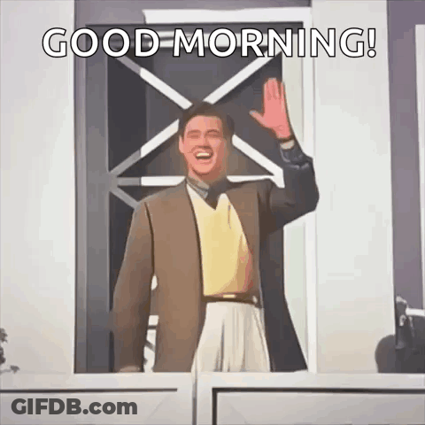 Man In Suit Waving Good Morning GIF