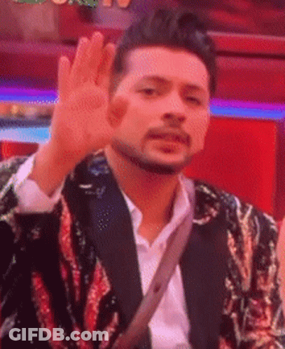 Man In Suit Waving Hand GIF