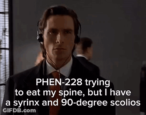 Man In Suit Wearing Headphones GIF